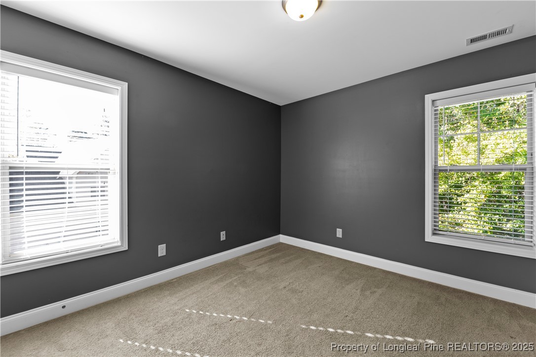 178 Tun Tavern Drive Cameron, NC 28326 - Photo 23 of 30 a view of an empty room with a window