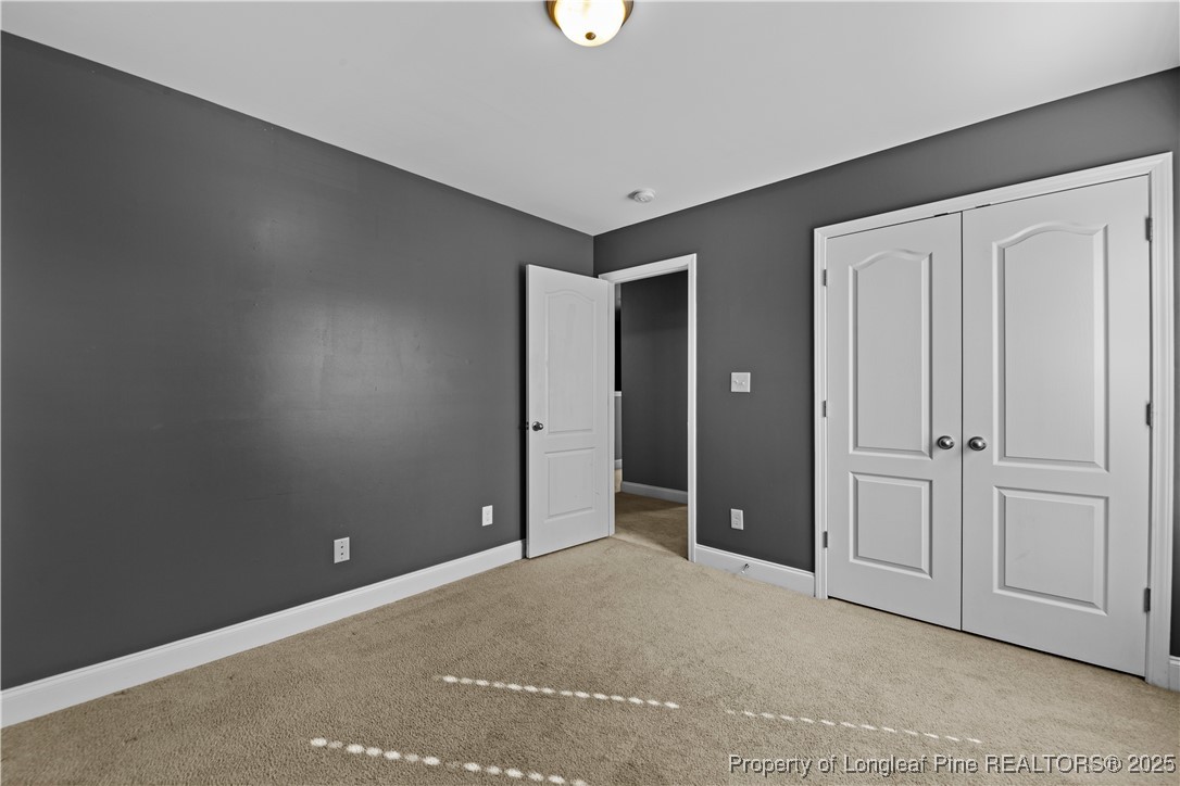 178 Tun Tavern Drive Cameron, NC 28326 - Photo 24 of 30 a view of an empty room with window and closet area