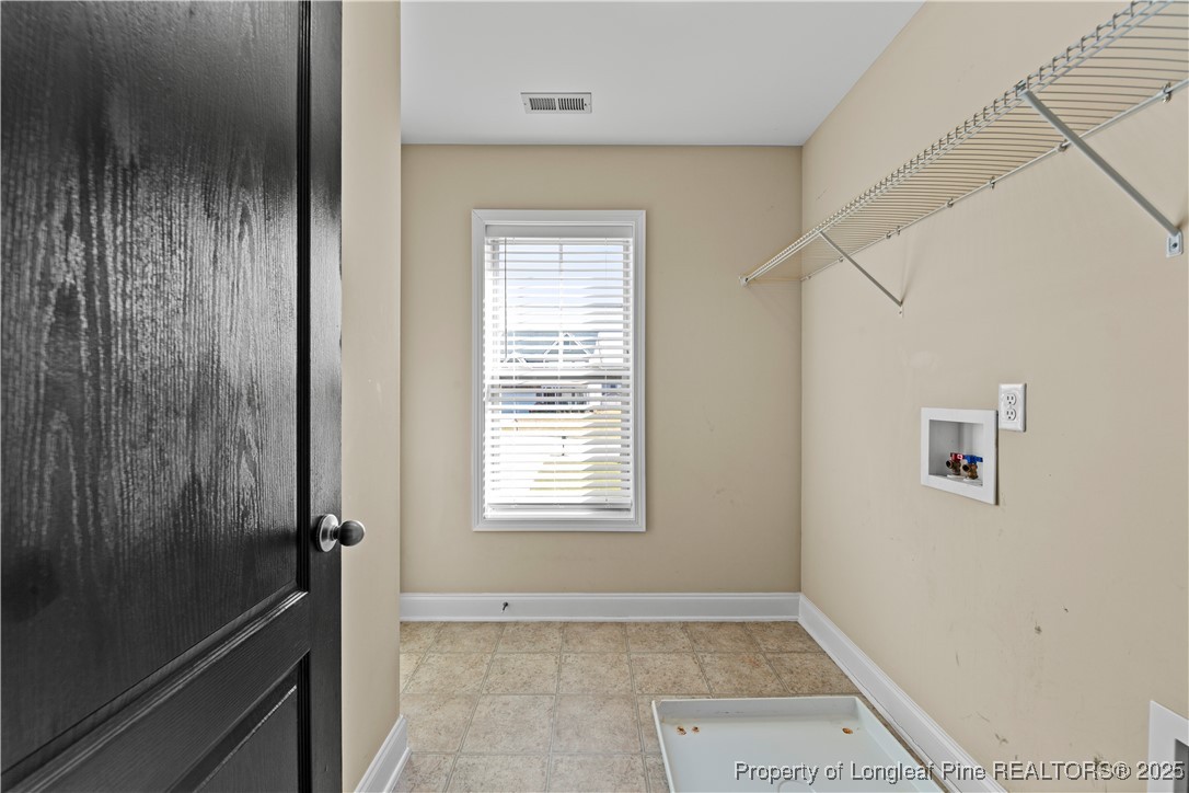 178 Tun Tavern Drive Cameron, NC 28326 - Photo 26 of 30 a view of an empty room with a window