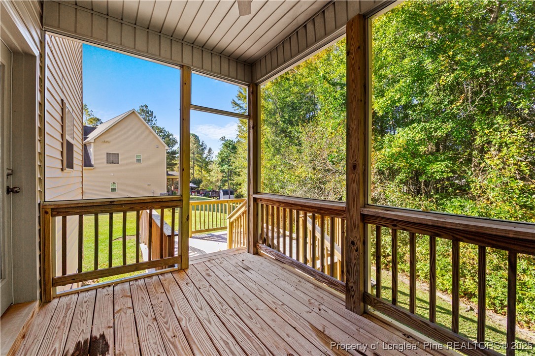 178 Tun Tavern Drive Cameron, NC 28326 - Photo 27 of 30 a view of a wooden house with a balcony
