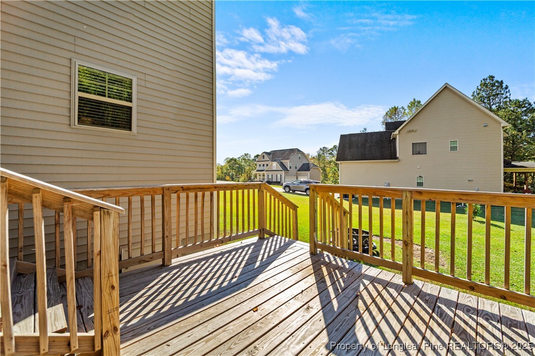 178 Tun Tavern Drive Cameron, NC 28326 - Photo 29 of 30 a view of balcony with wooden floor and fence