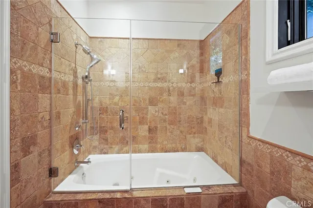 a bathroom with a bath tub