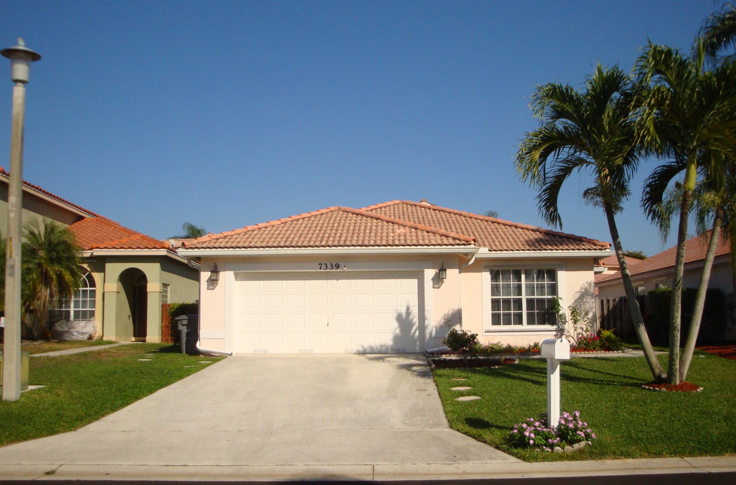7339 Michigan Isle Road Lake Worth, FL 33467 - Photo 1 of 26 Exterior