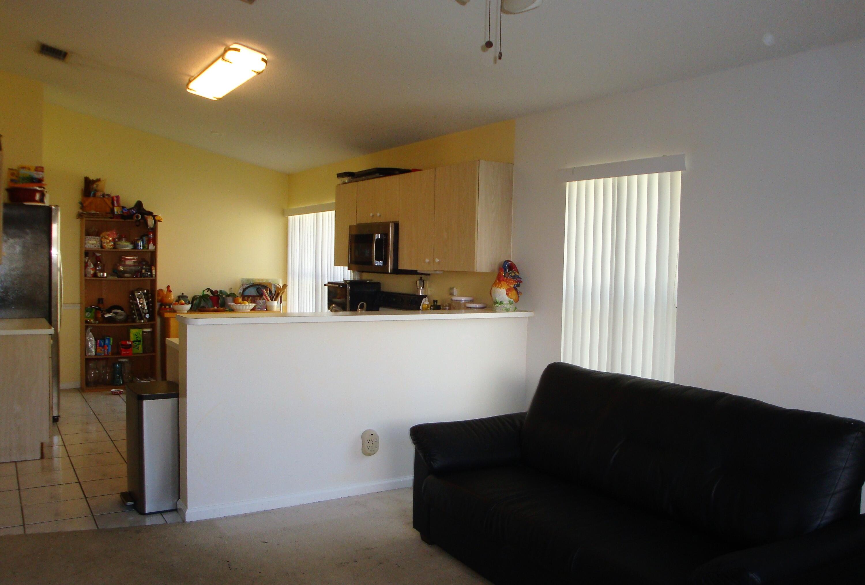 7339 Michigan Isle Road Lake Worth, FL 33467 - Photo 11 of 26 Kitchen/Family Room