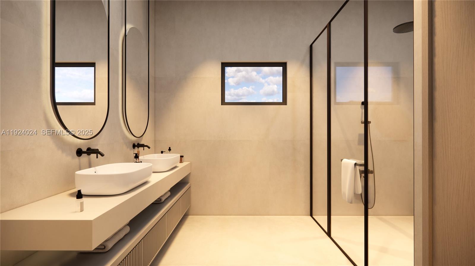 1105 Southwest 22nd Terrace Miami, FL 33129 - Photo 29 of 56 a bathroom with a sink and a mirror