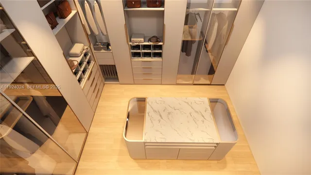 a media room with furniture a rug and a projector