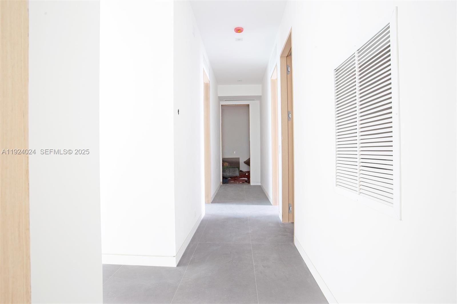 1105 Southwest 22nd Terrace Miami, FL 33129 - Photo 42 of 56 a view of a hallway with closet