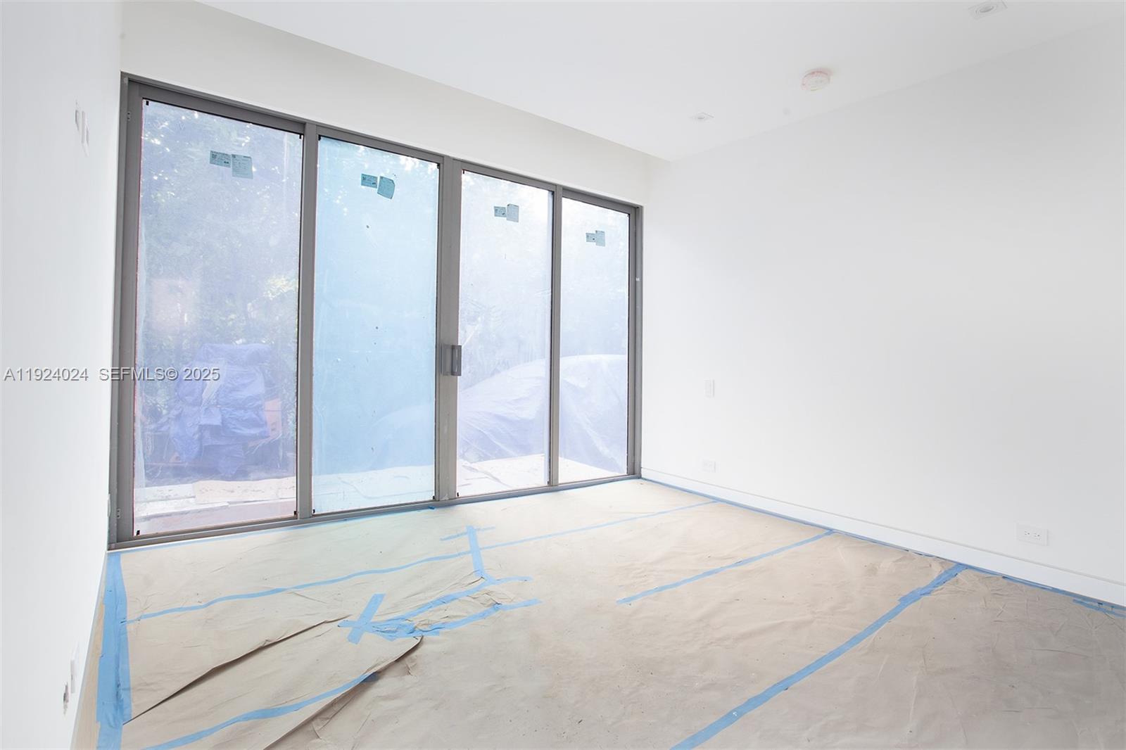 1105 Southwest 22nd Terrace Miami, FL 33129 - Photo 50 of 56 a view of an empty room and window