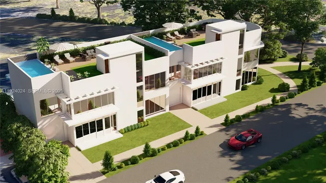 aerial view of a house with a yard