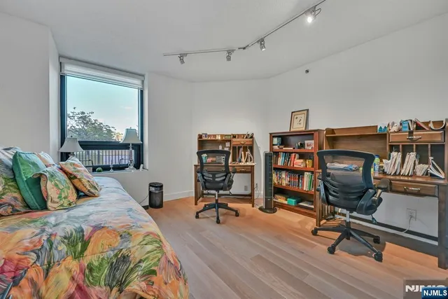 a bedroom with furniture and a bed