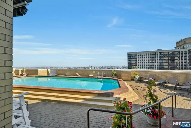 a view of a balcony with city view
