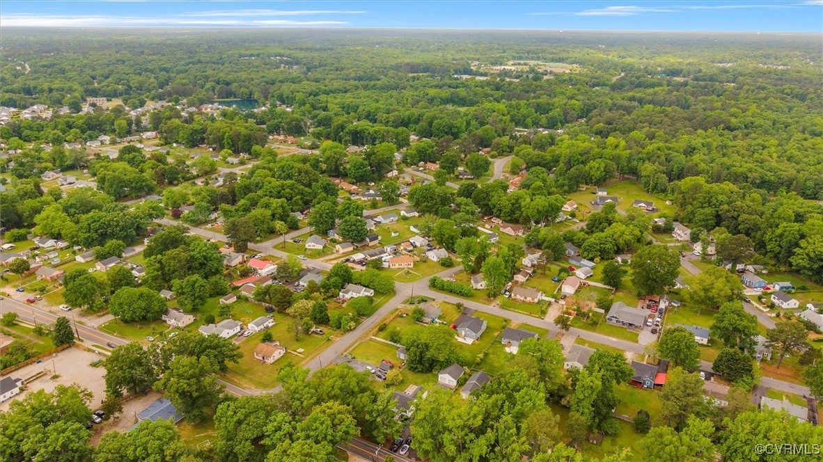 4444 Cogbill Road Richmond, VA 23234 - Photo 29 of 32 Drone / aerial view of a heavily wooded area