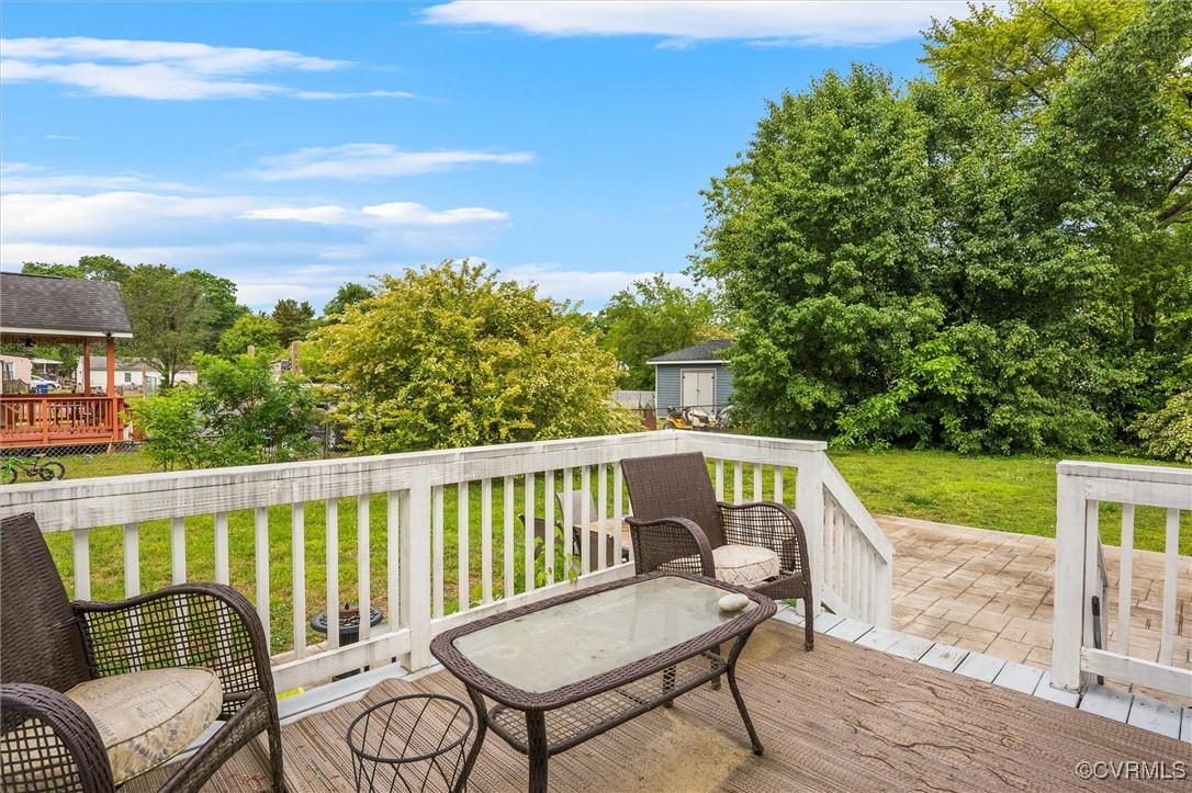 4444 Cogbill Road Richmond, VA 23234 - Photo 32 of 32 Deck featuring a lawn
