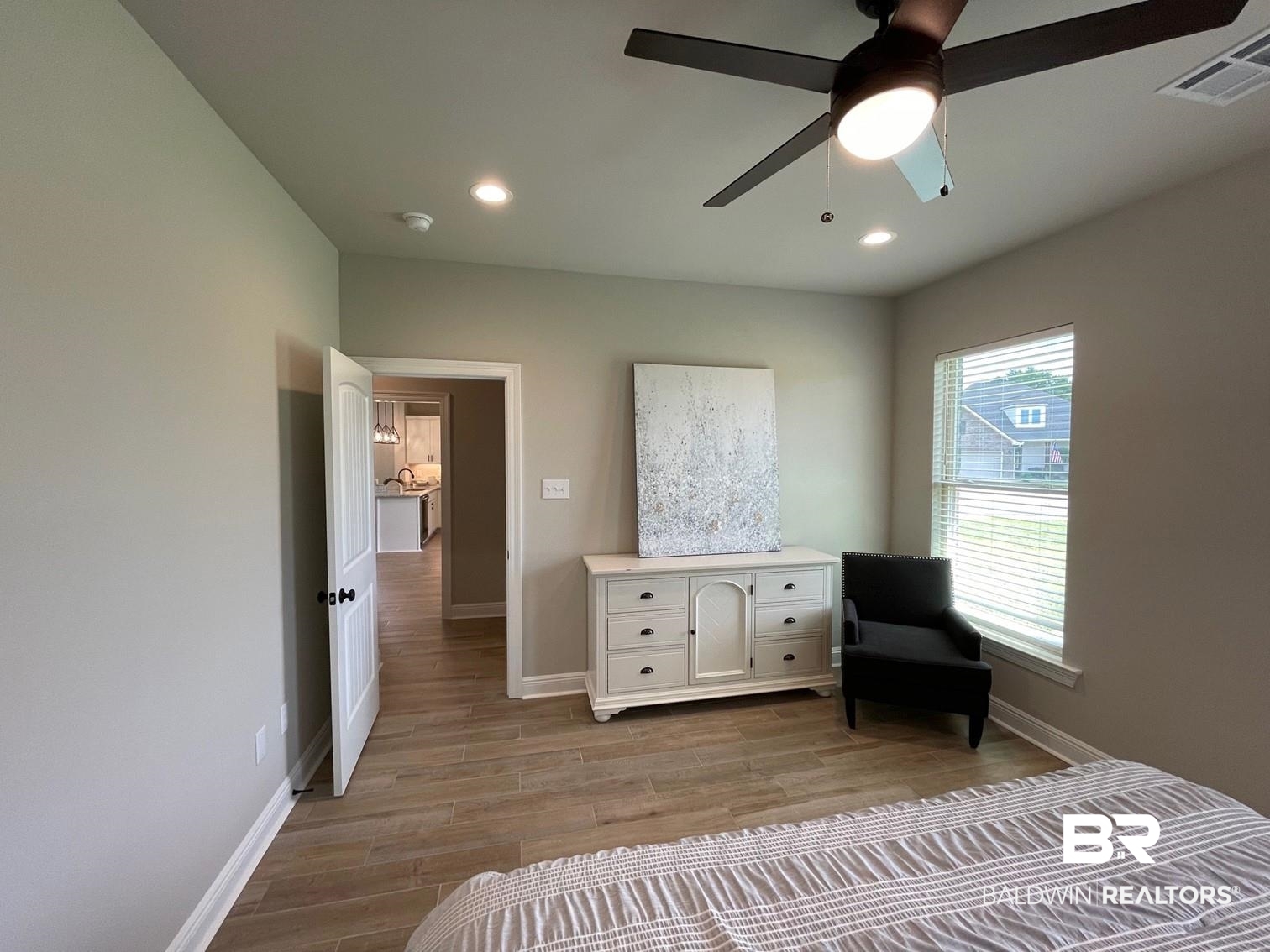 9961 Chipper Lane Foley, AL 36535 - Photo 10 of 16 Bedroom featuring light hardwood / wood-style flooring and ceiling fan