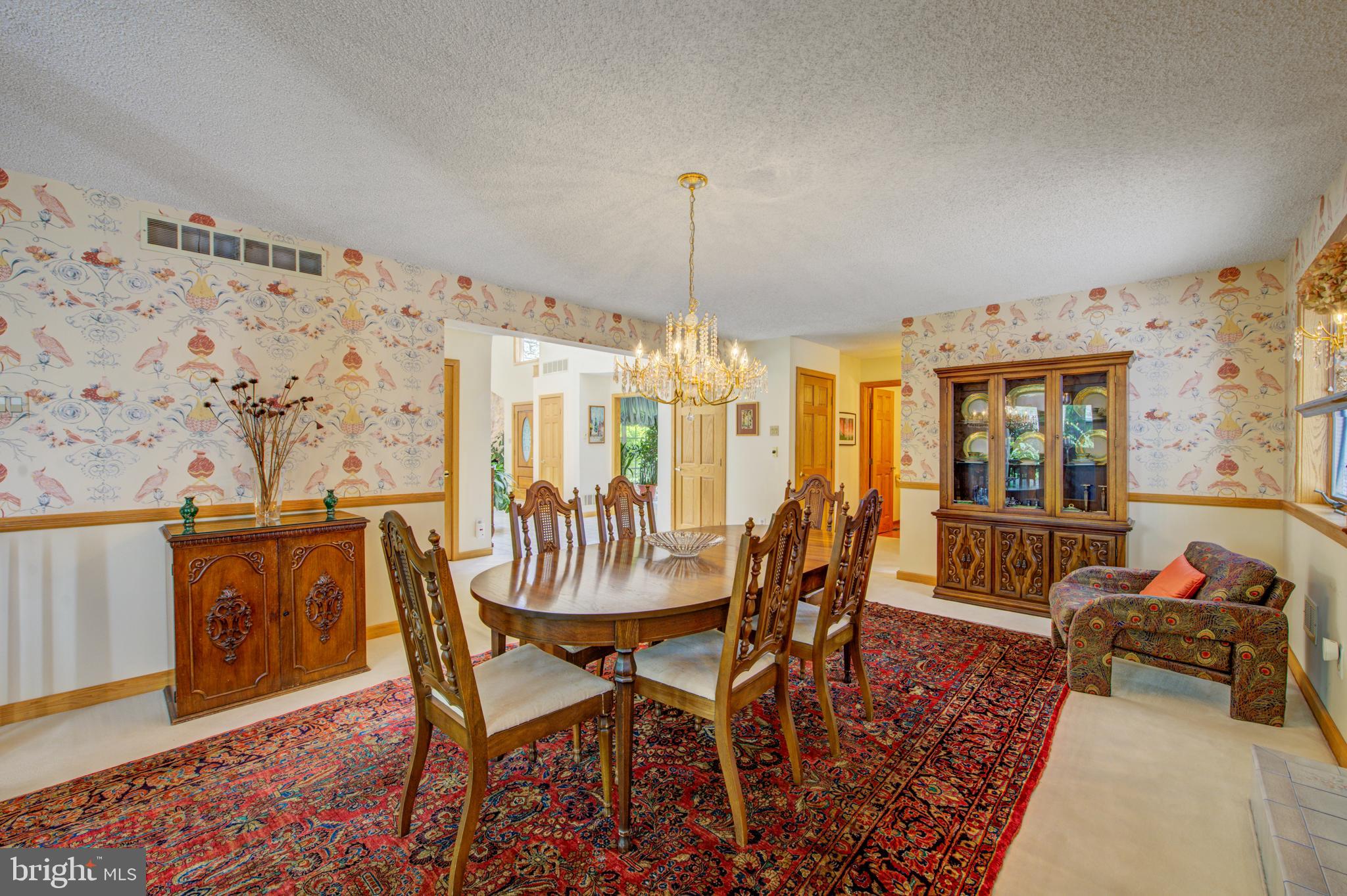 20 Woodbrook Road Voorhees, NJ 08043 - Photo 11 of 46 a dining room with furniture and wooden floor