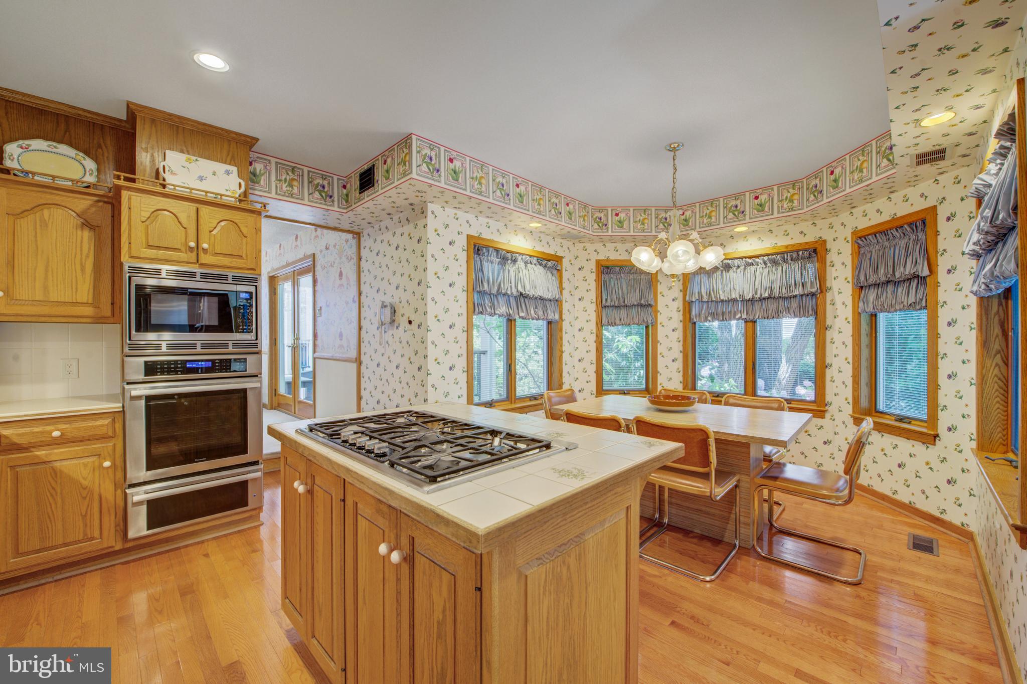 20 Woodbrook Road Voorhees, NJ 08043 - Photo 12 of 46 a kitchen with stainless steel appliances granite countertop a stove and a refrigerator