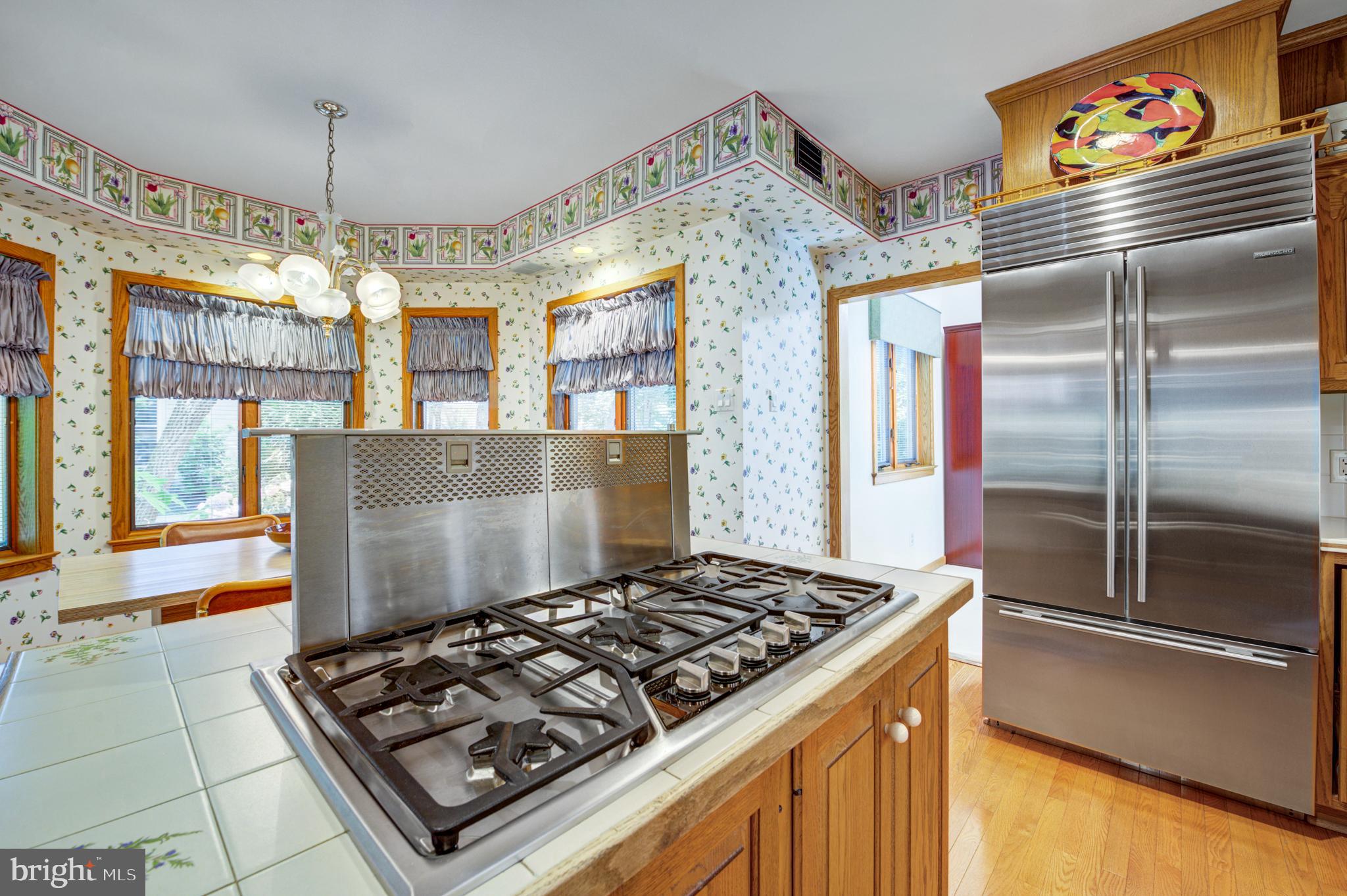 20 Woodbrook Road Voorhees, NJ 08043 - Photo 14 of 46 a stove top oven sitting inside of a kitchen