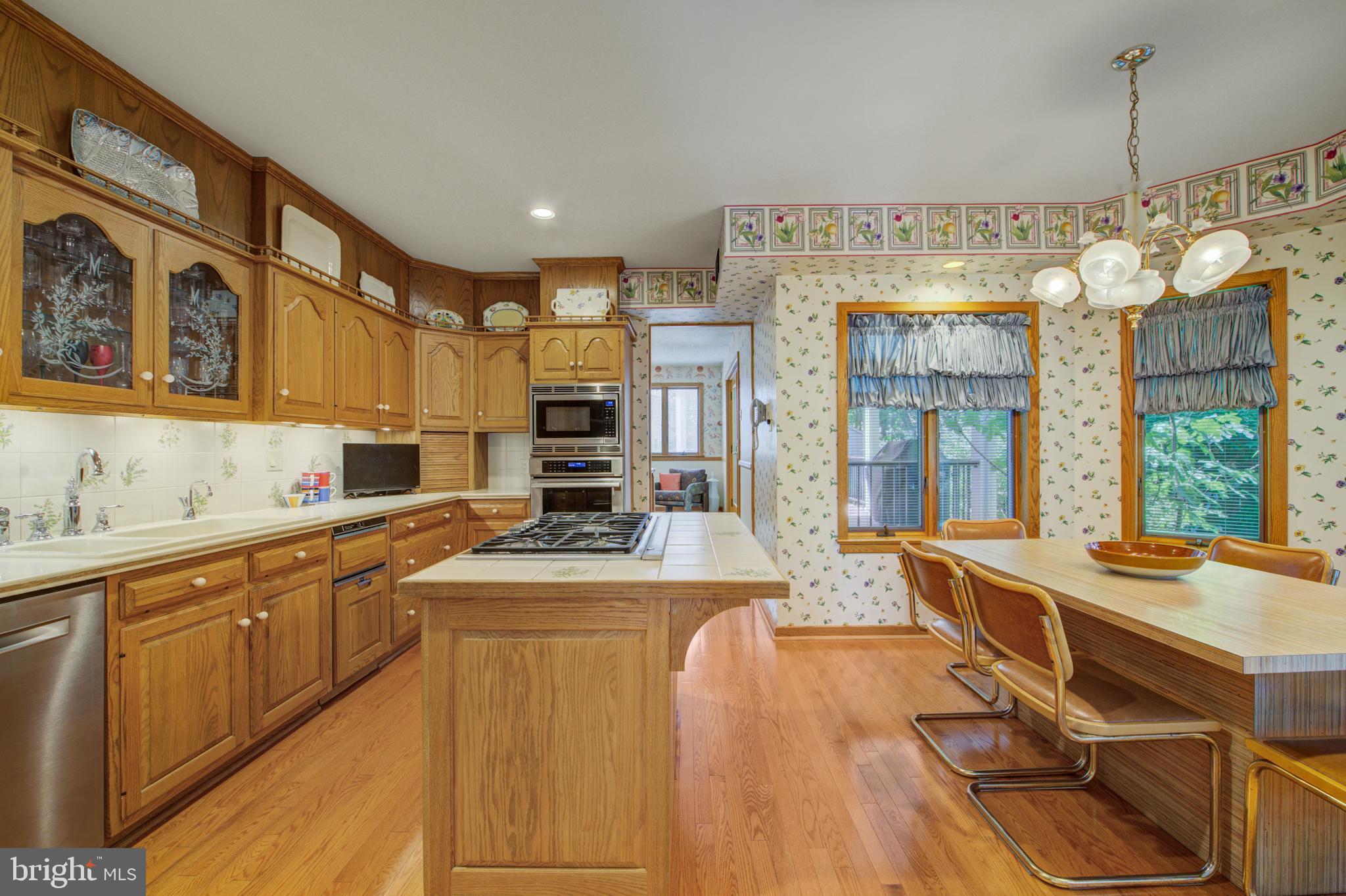 20 Woodbrook Road Voorhees, NJ 08043 - Photo 15 of 46 a kitchen with stainless steel appliances granite countertop a sink and cabinets