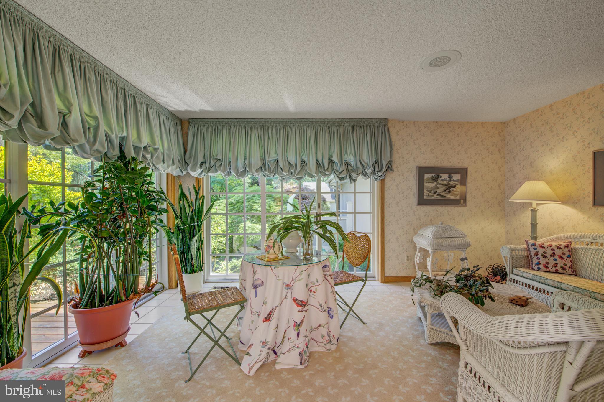 20 Woodbrook Road Voorhees, NJ 08043 - Photo 17 of 46 a living room with furniture and a potted plant