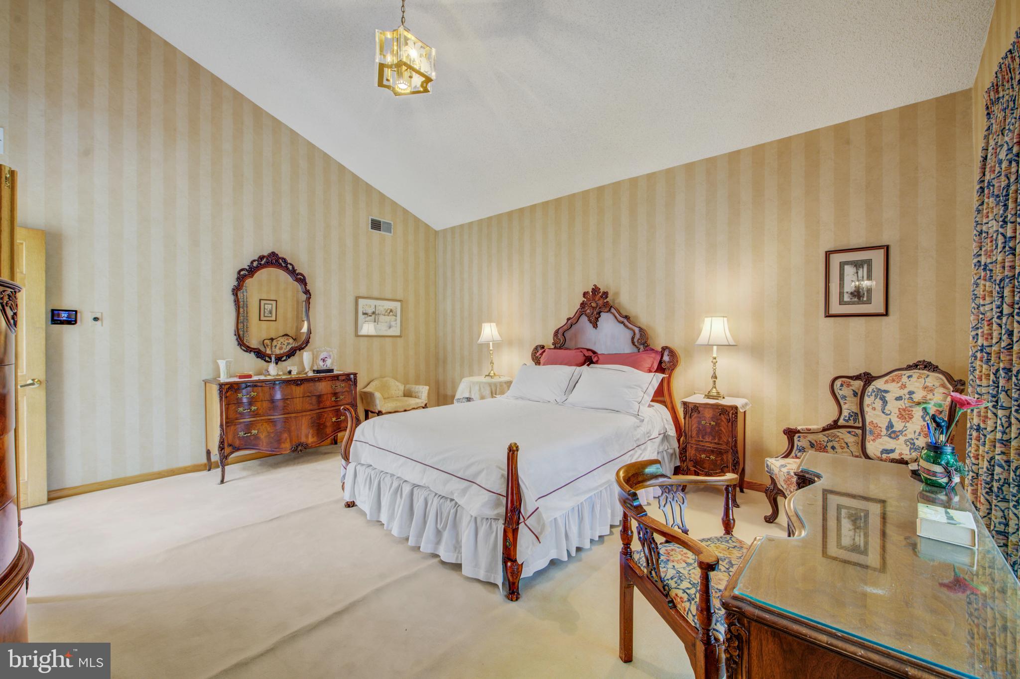 20 Woodbrook Road Voorhees, NJ 08043 - Photo 24 of 46 a bed room with a bed mirror and a table