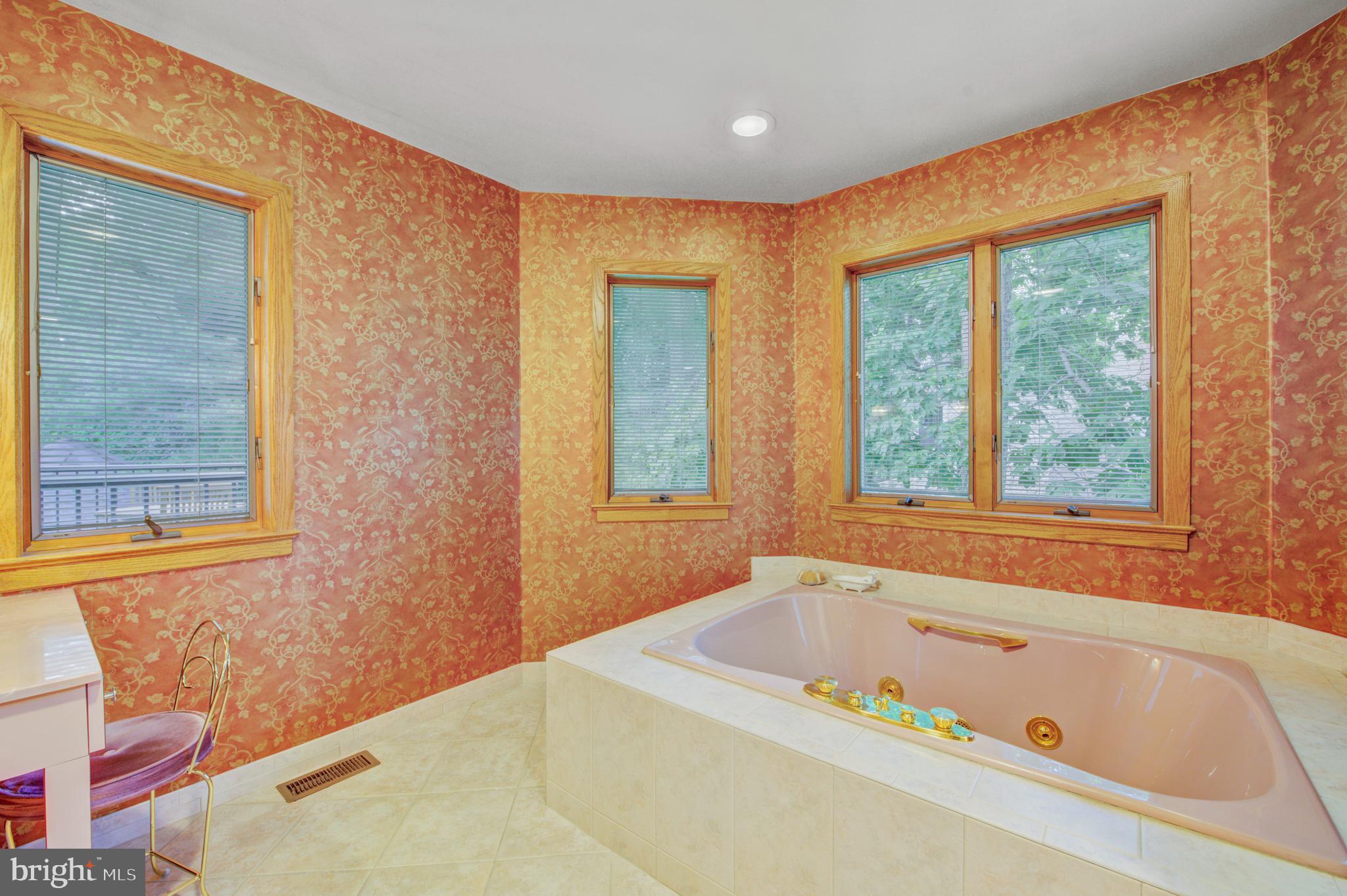 20 Woodbrook Road Voorhees, NJ 08043 - Photo 26 of 46 a bathroom with a bathtub and window