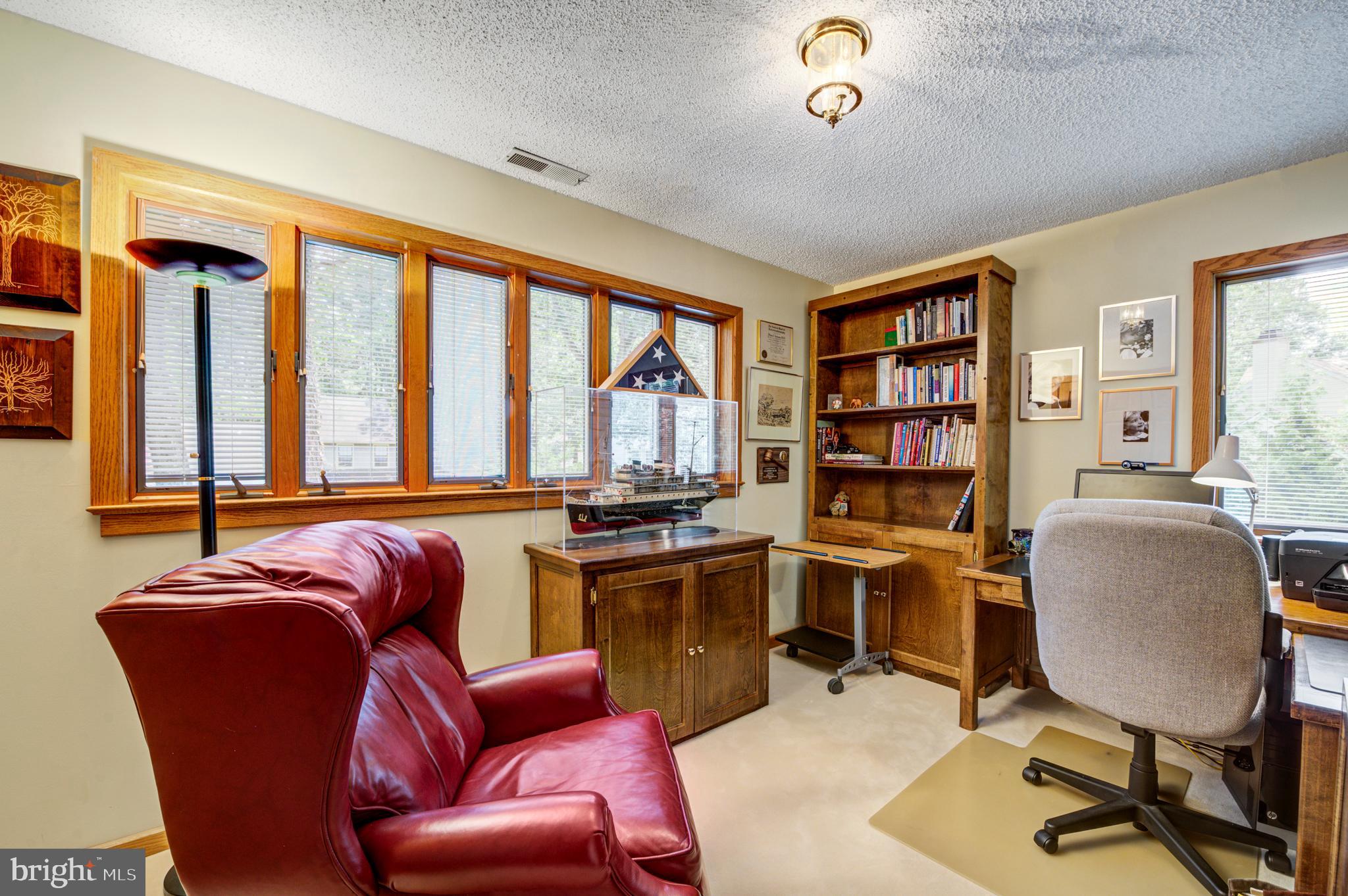 20 Woodbrook Road Voorhees, NJ 08043 - Photo 31 of 46 a view of a livingroom with workspace and a window