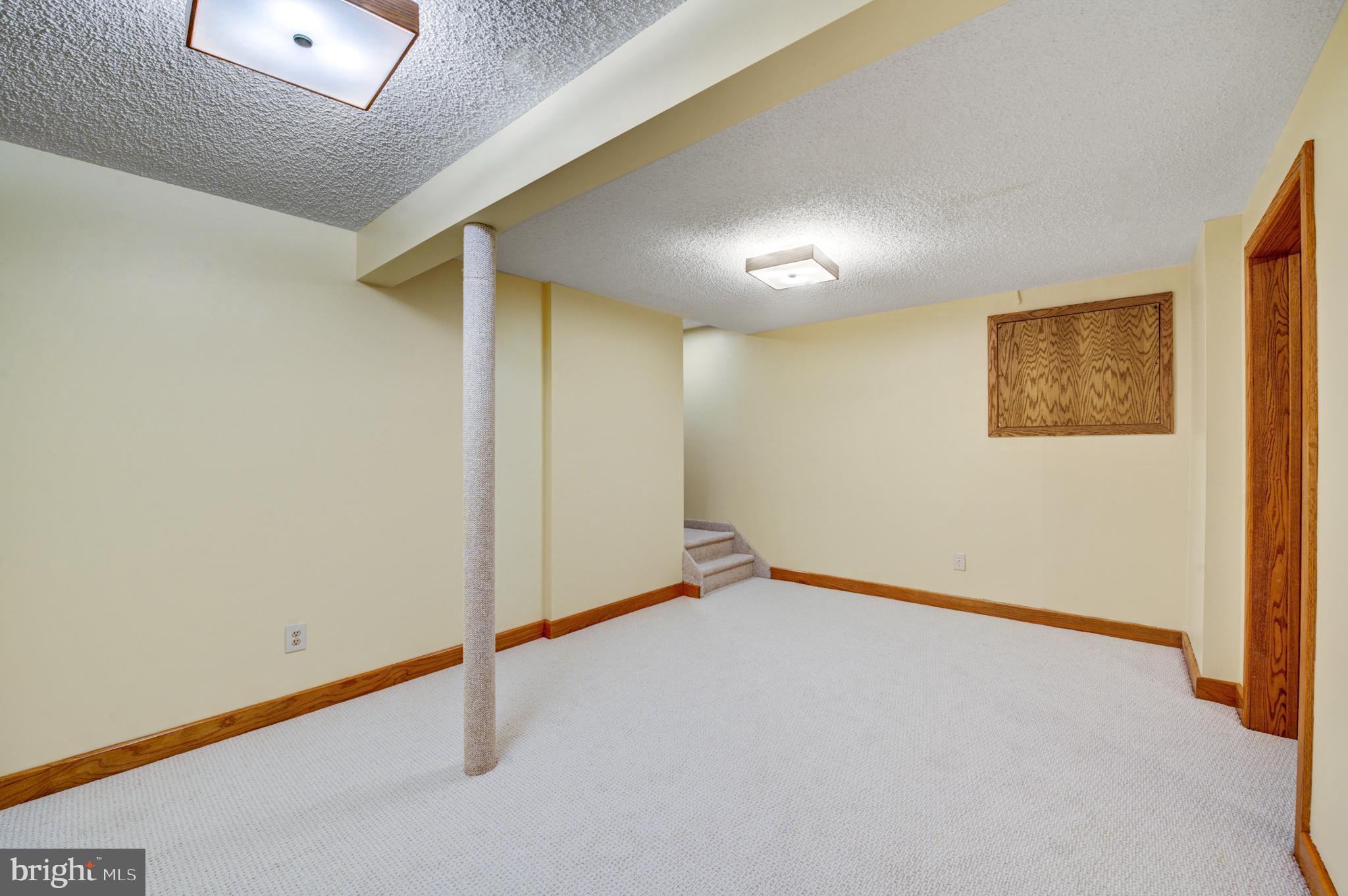 20 Woodbrook Road Voorhees, NJ 08043 - Photo 37 of 46 an empty room with a empty space and a window