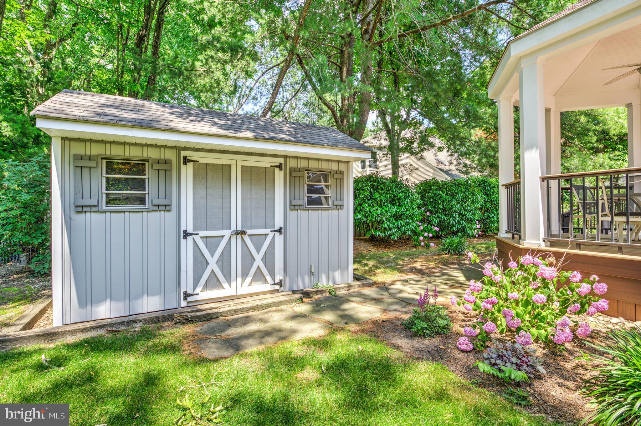 20 Woodbrook Road Voorhees, NJ 08043 - Photo 46 of 46 a view of a house with a small yard and wooden fence
