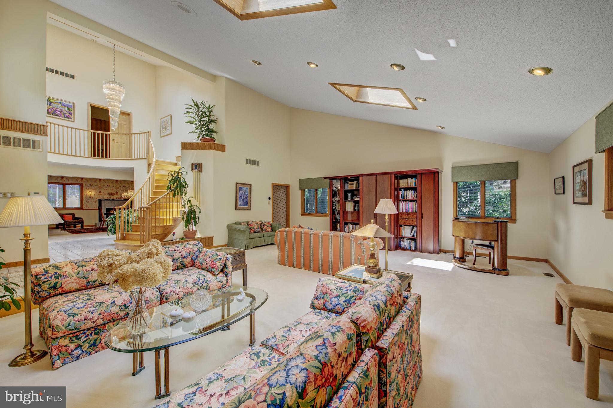 20 Woodbrook Road Voorhees, NJ 08043 - Photo 6 of 46 a living room with furniture and a large window