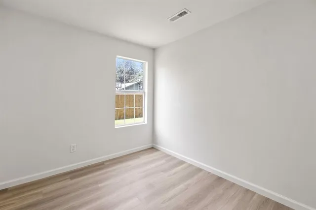 an empty room with a window