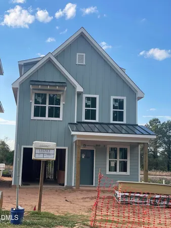 a front view of a house with parking