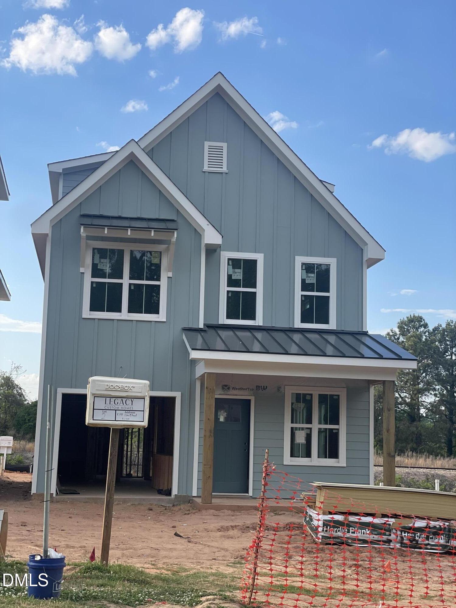 a front view of a house with parking