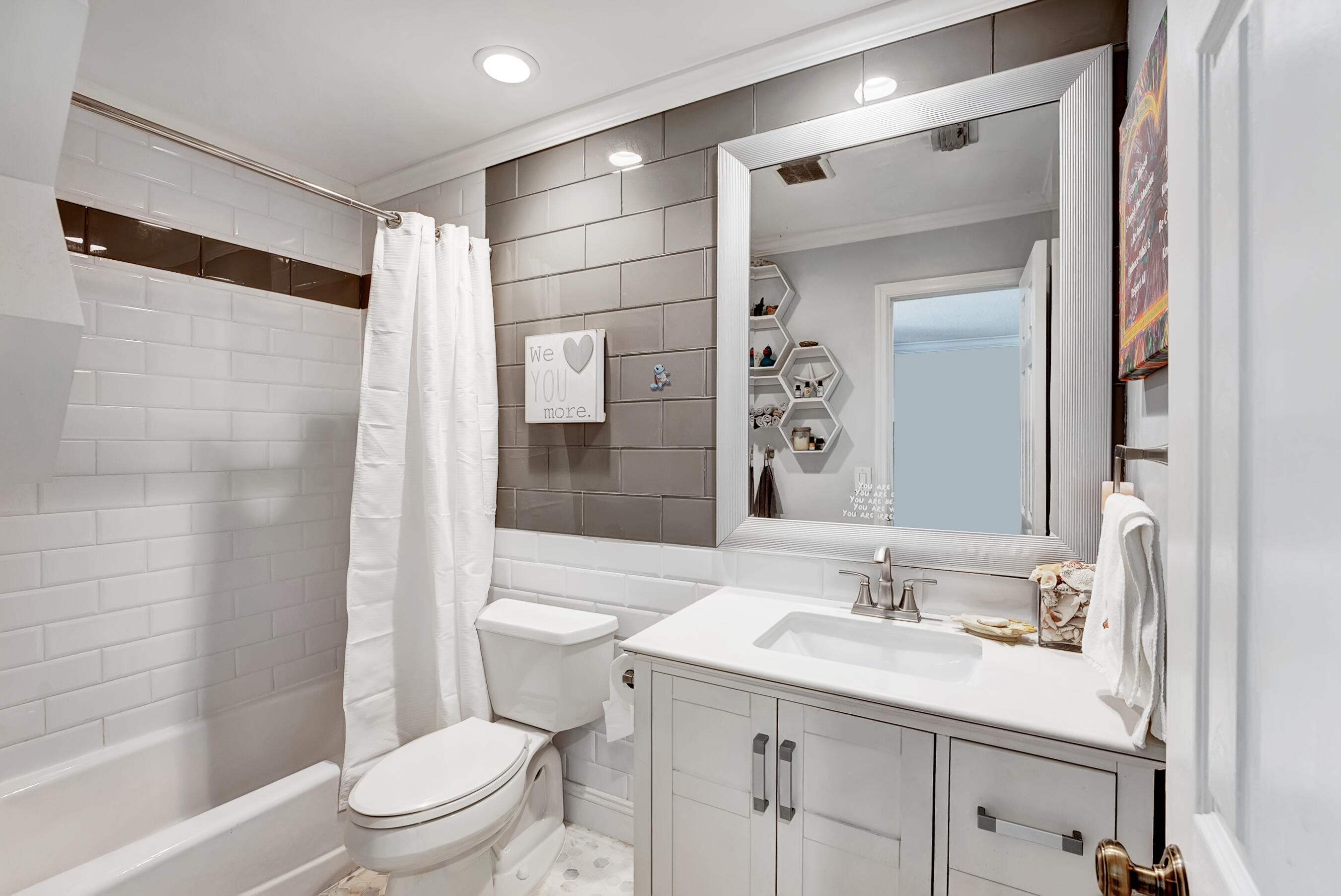 6366 Pond Apple Road Boca Raton, FL 33433 - Photo 29 of 40 a bathroom with a sink toilet vanity and shower