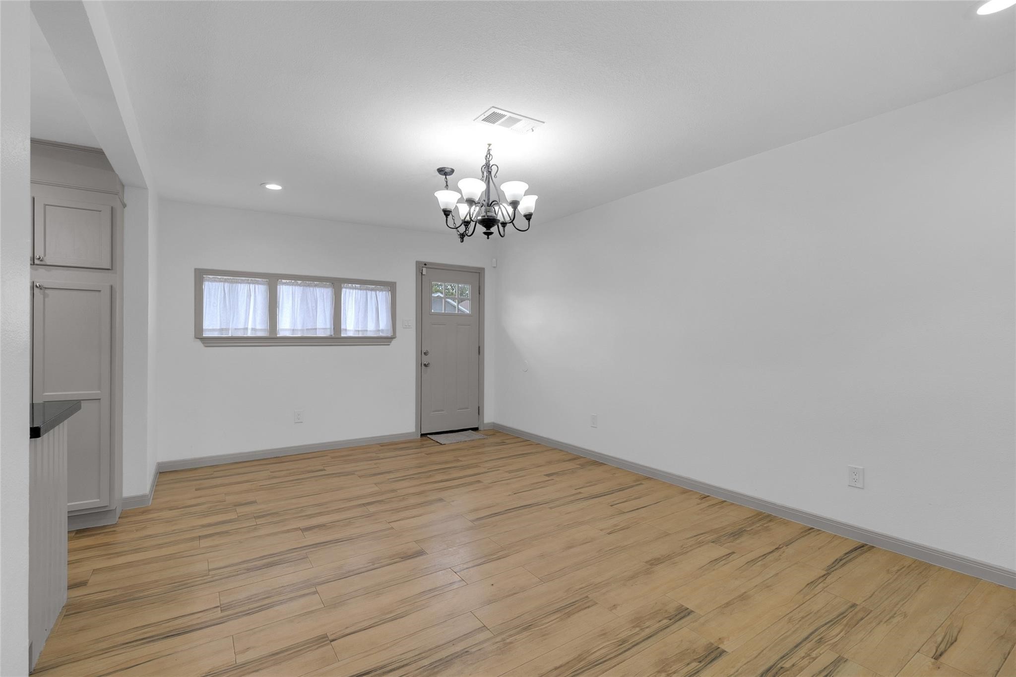 2934 Robertson Street Houston, TX 77009 - Photo 7 of 23 a view of an empty room with a window