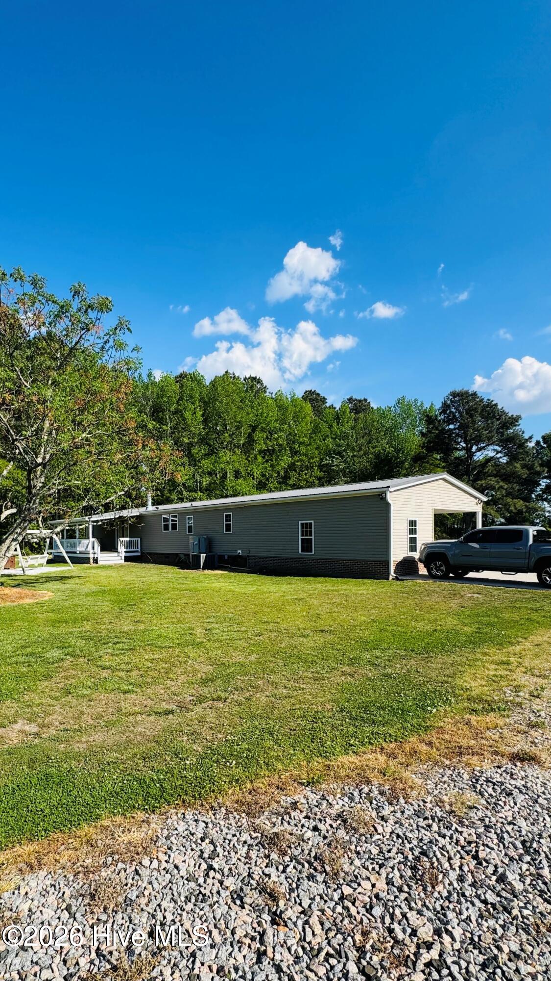 141 Up River Road Belvidere, NC 27919 - Photo 21 of 35 Back of home
