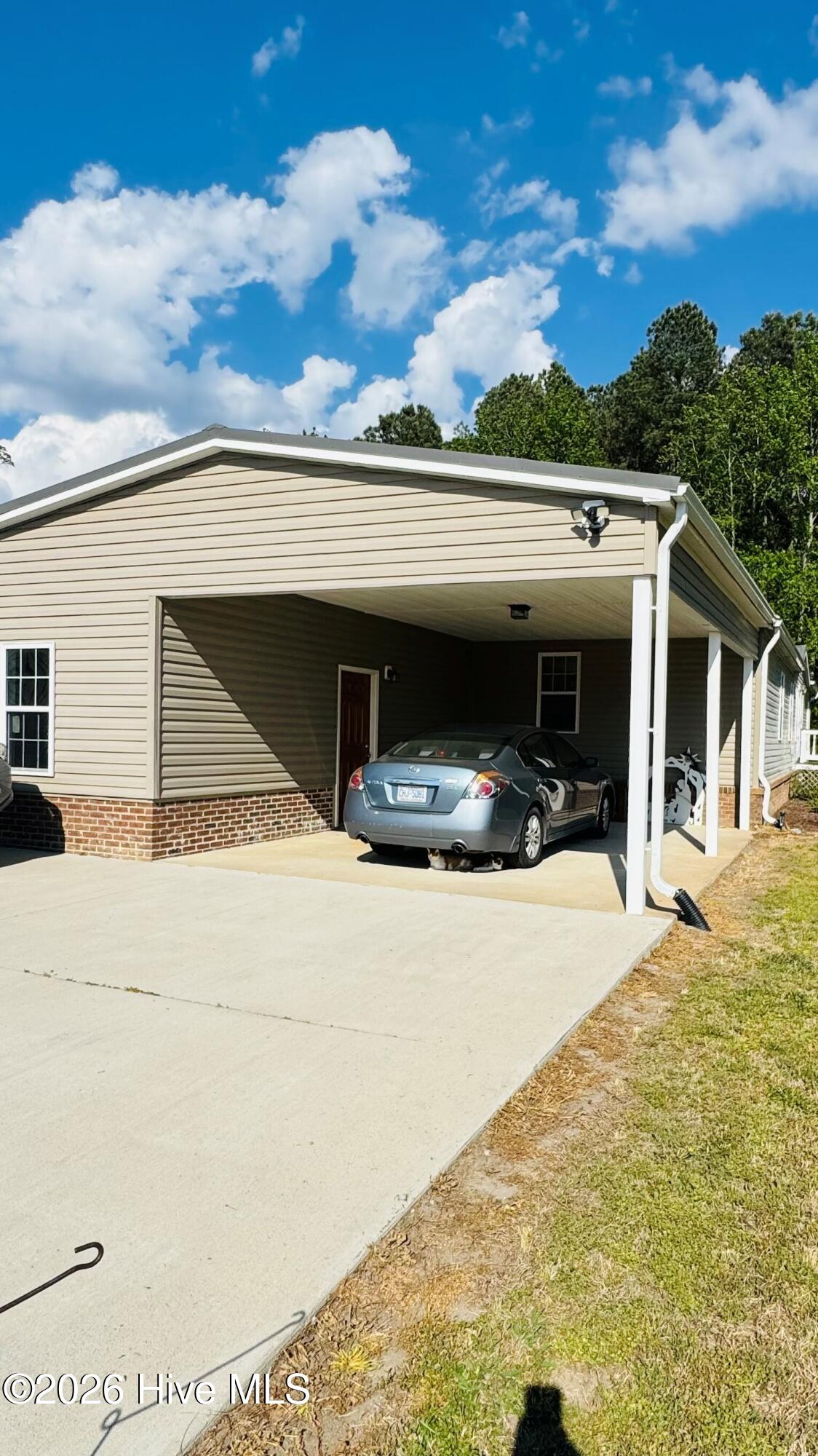 141 Up River Road Belvidere, NC 27919 - Photo 23 of 35 Additional concrete parking