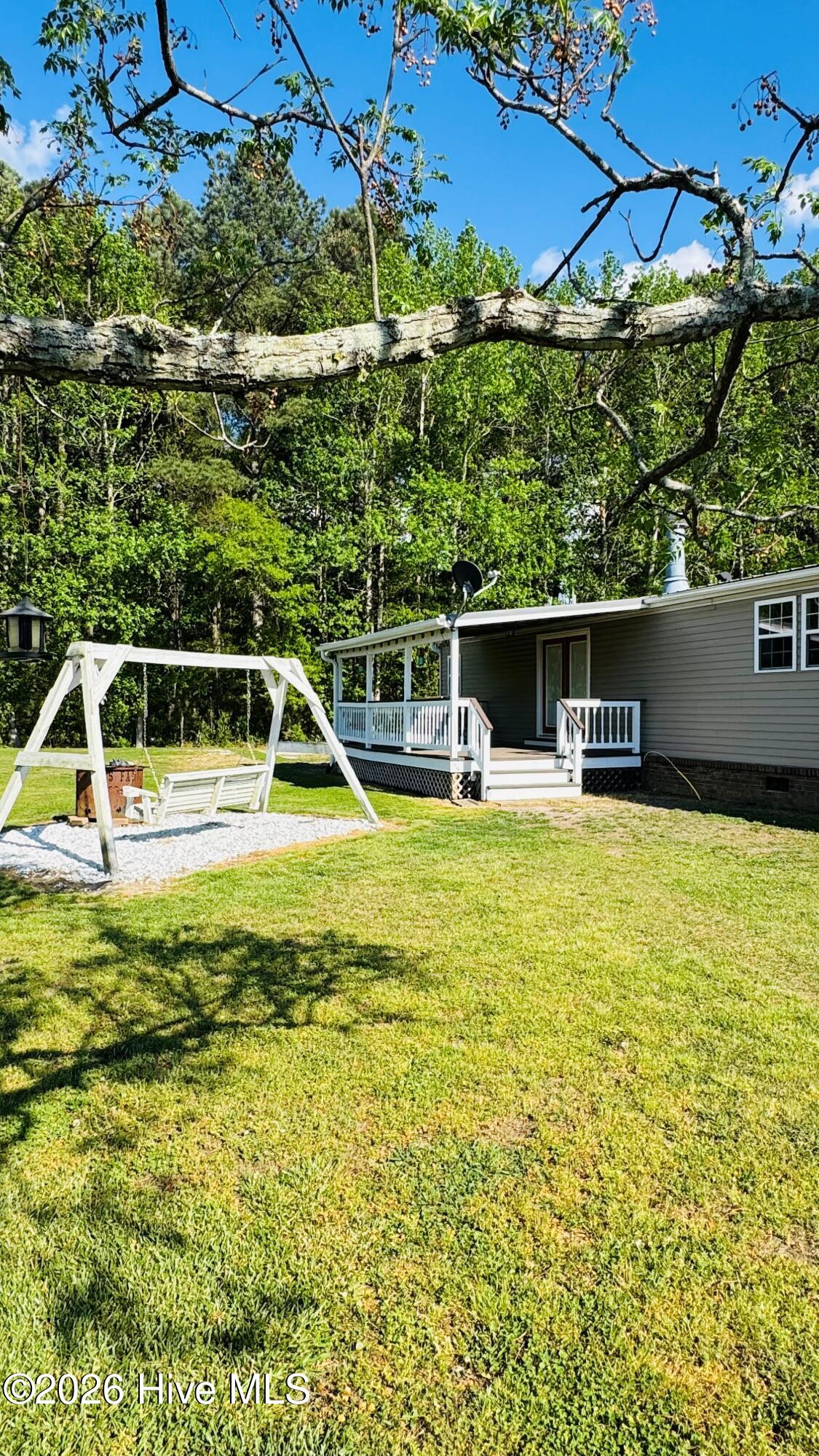 141 Up River Road Belvidere, NC 27919 - Photo 26 of 35 Back yard/porch