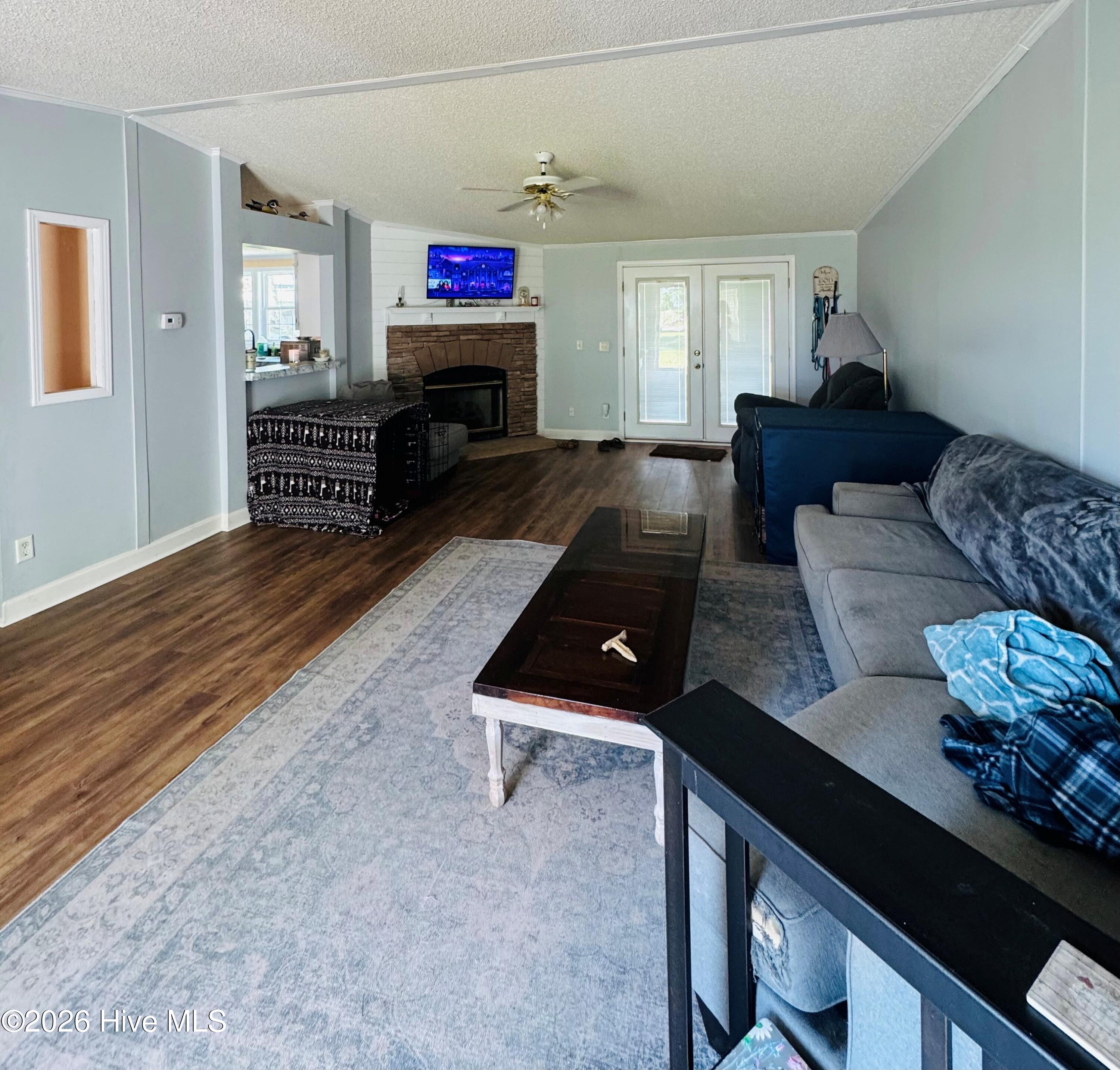141 Up River Road Belvidere, NC 27919 - Photo 5 of 35 Doors to back covered porch!