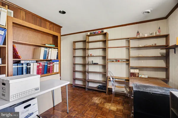 a view of a workspace with furniture