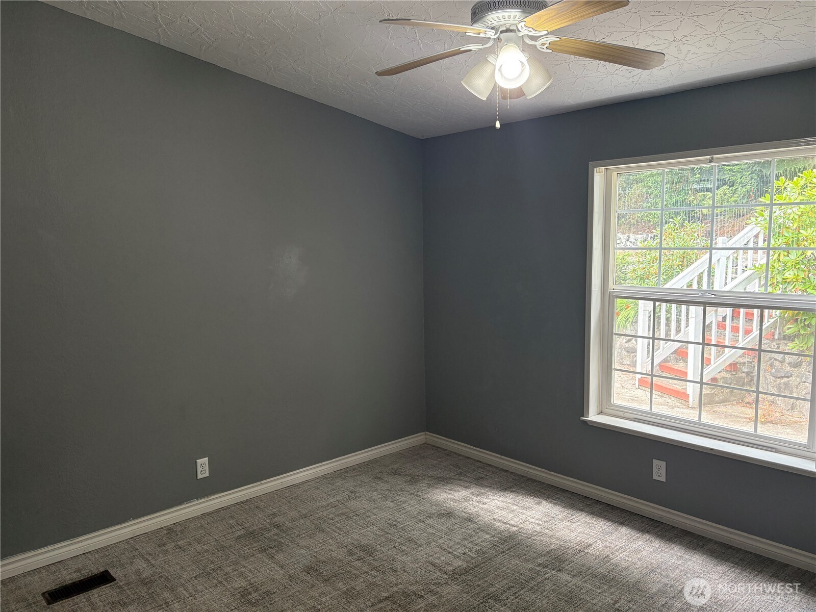 17411 64th St Court Northwest Vaughn, WA 98394 - Photo 14 of 27 an empty room with a window