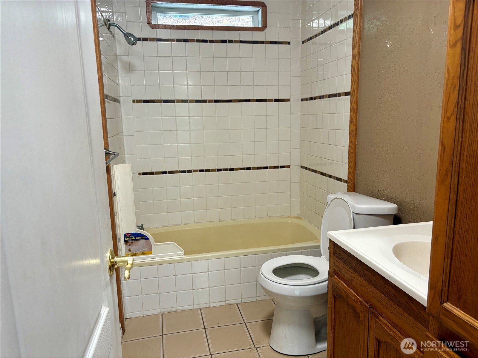 17411 64th St Court Northwest Vaughn, WA 98394 - Photo 16 of 27 a bathroom with a sink a toilet and shower