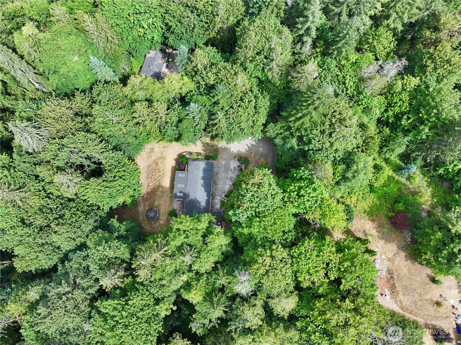 17411 64th St Court Northwest Vaughn, WA 98394 - Photo 25 of 27 an aerial view of a house with a yard