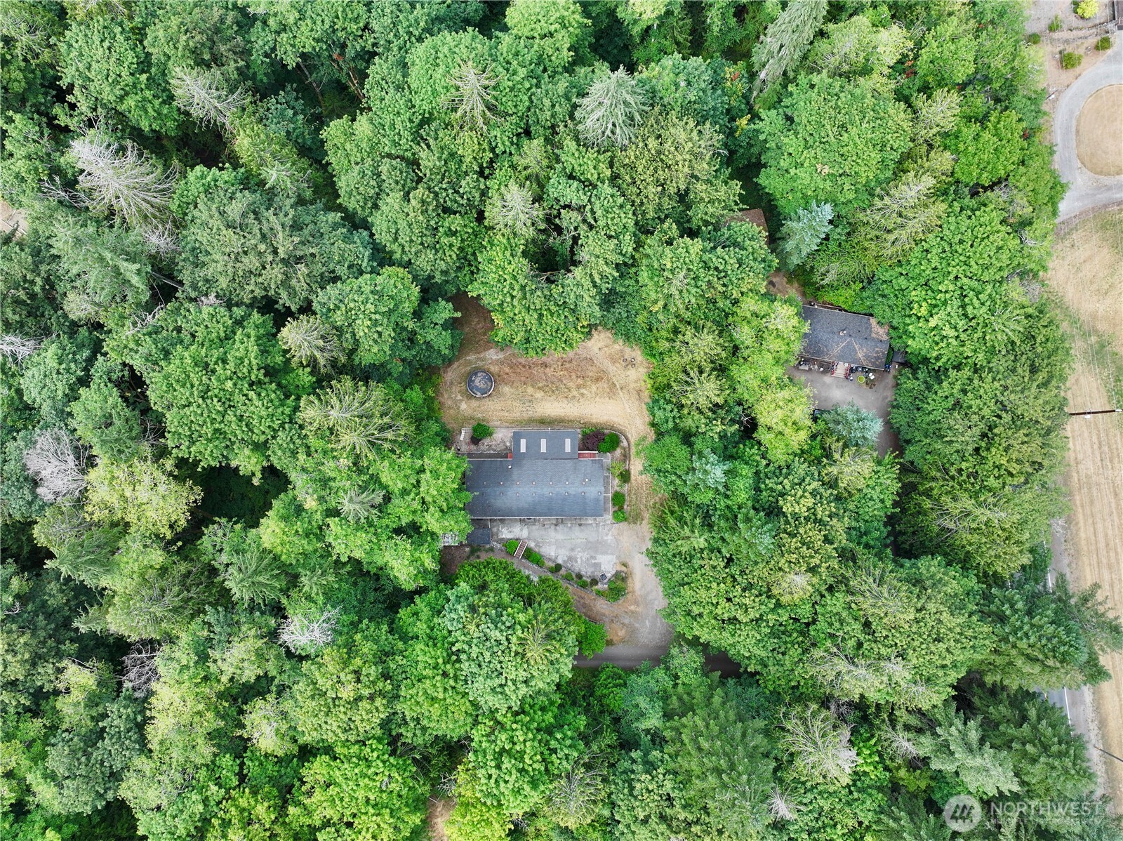 17411 64th St Court Northwest Vaughn, WA 98394 - Photo 4 of 27 an aerial view of a house with a yard