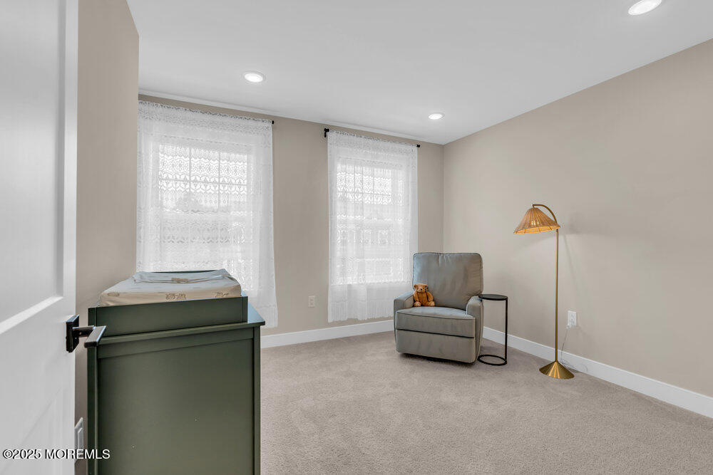 3028 Quail Rdg Boulevard, Unit 606 Farmingdale, NJ 07727 - Photo 37 of 82 a living room with furniture and a window