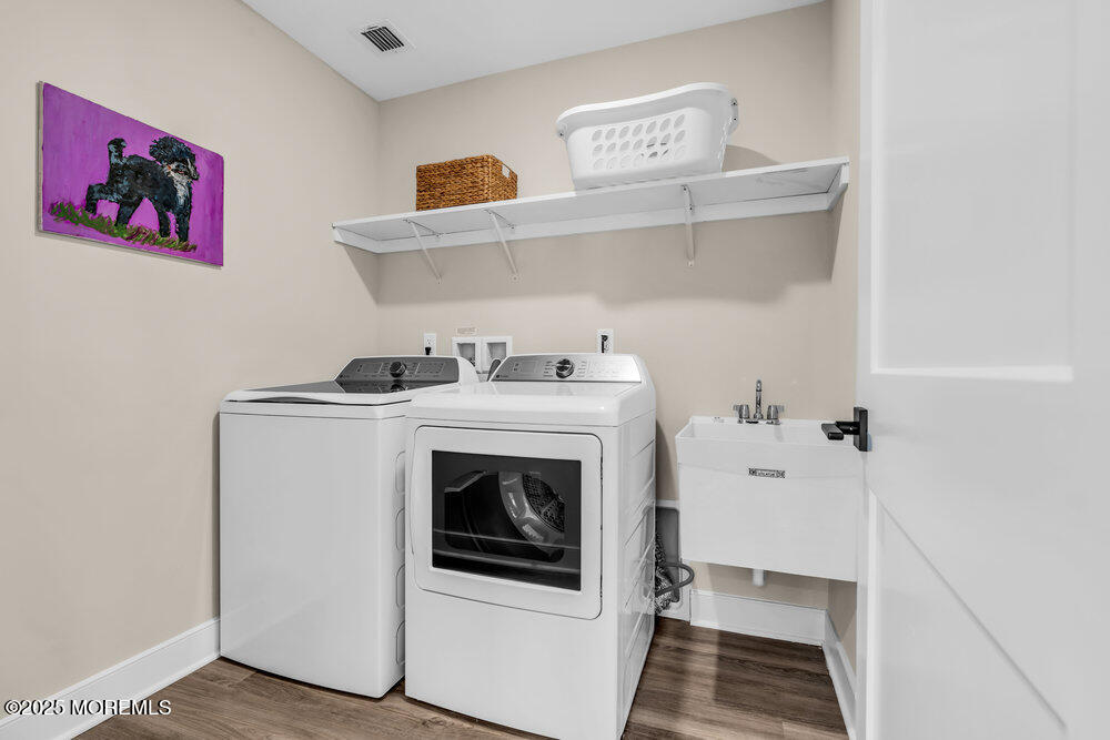 3028 Quail Rdg Boulevard, Unit 606 Farmingdale, NJ 07727 - Photo 46 of 82 a utility room with dryer and washer