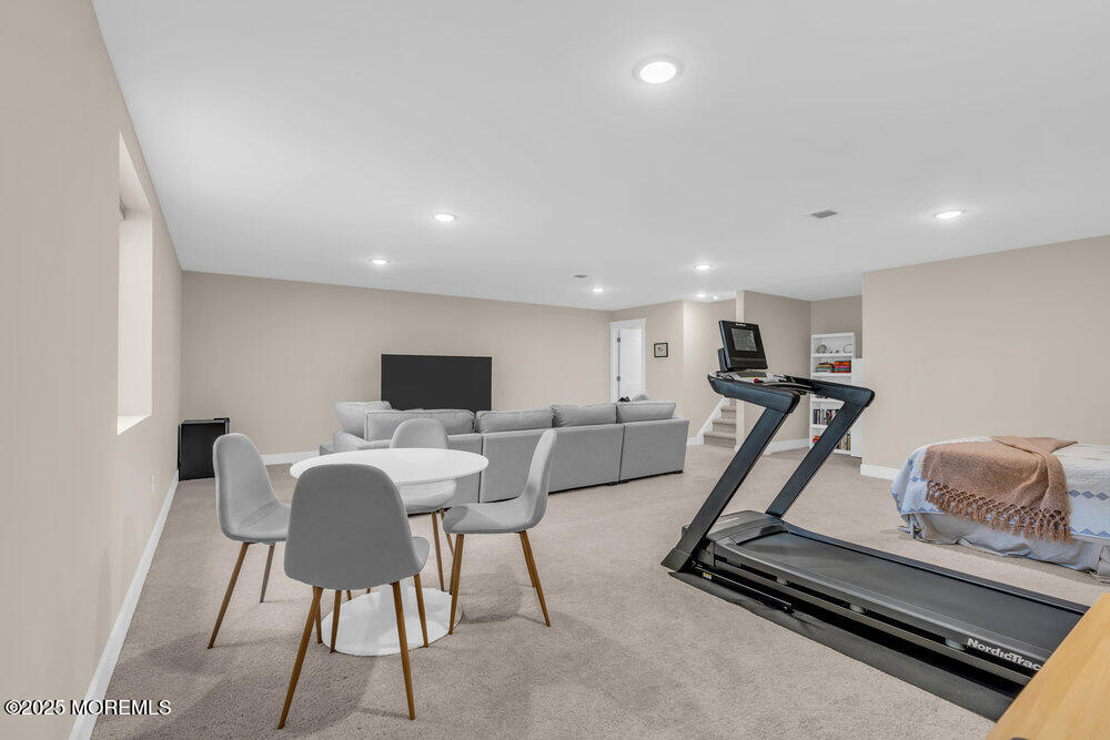 3028 Quail Rdg Boulevard, Unit 606 Farmingdale, NJ 07727 - Photo 55 of 82 a view of a room with gym equipment