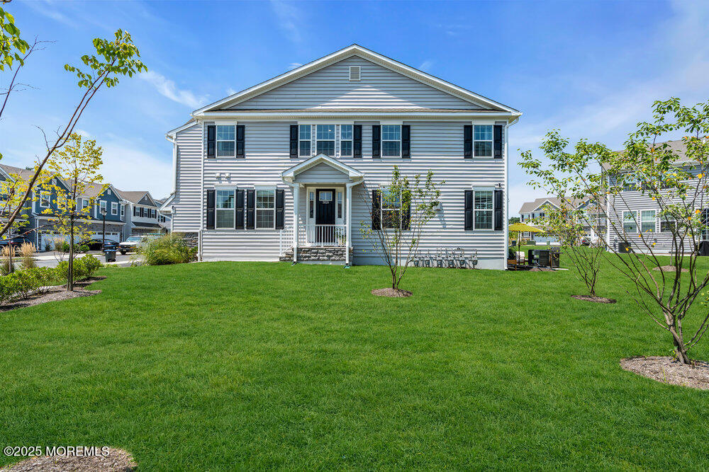 3028 Quail Rdg Boulevard, Unit 606 Farmingdale, NJ 07727 - Photo 64 of 82 a front view of house with yard and green space