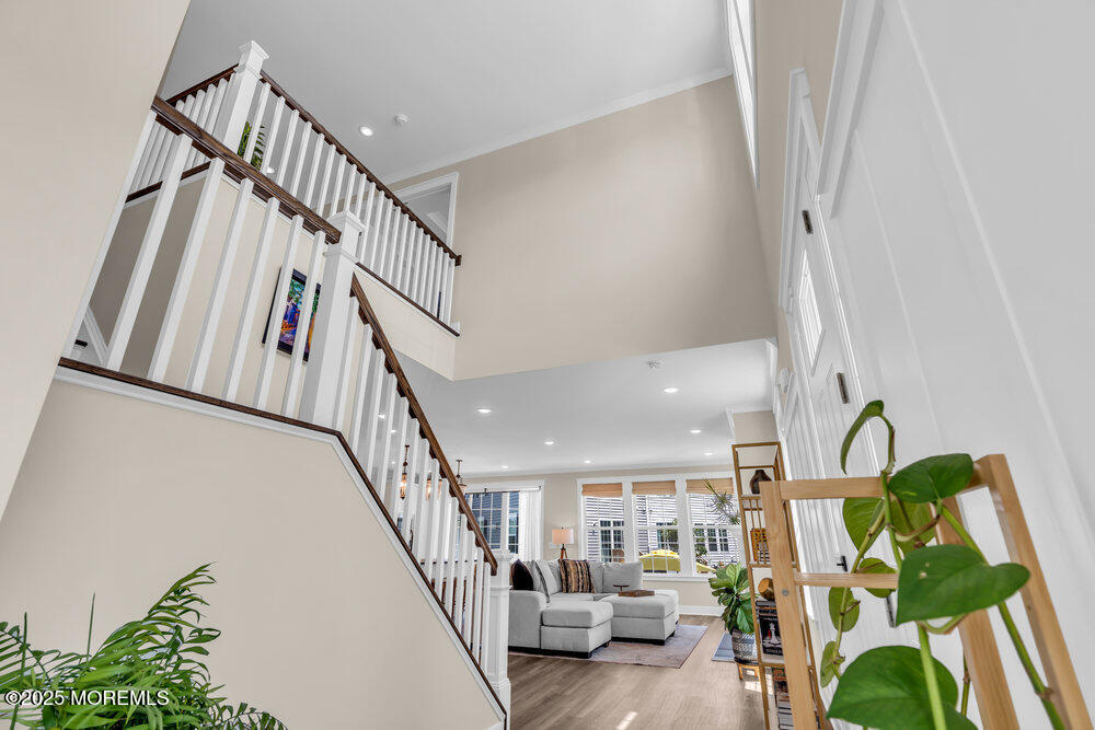 3028 Quail Rdg Boulevard, Unit 606 Farmingdale, NJ 07727 - Photo 79 of 82 a view of entryway livingroom and hall