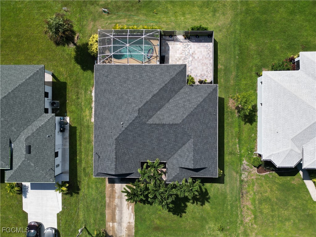 3003 25th Street West Lehigh Acres, FL 33971 - Photo 2 of 25 an aerial view of a house with a yard