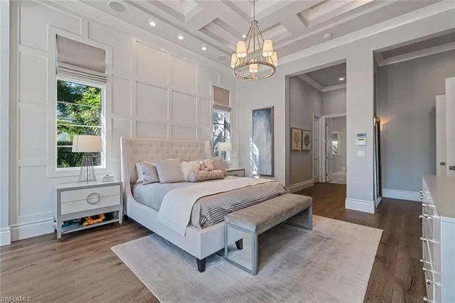 a view of front door with wooden floor